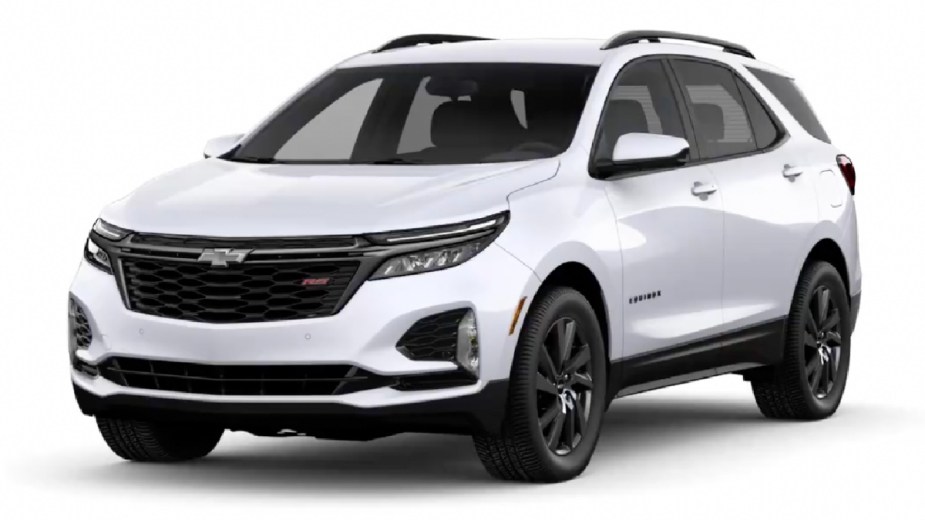 Front angle view of new 2023 Chevy Equinox crossover SUV with Summit White exterior paint color