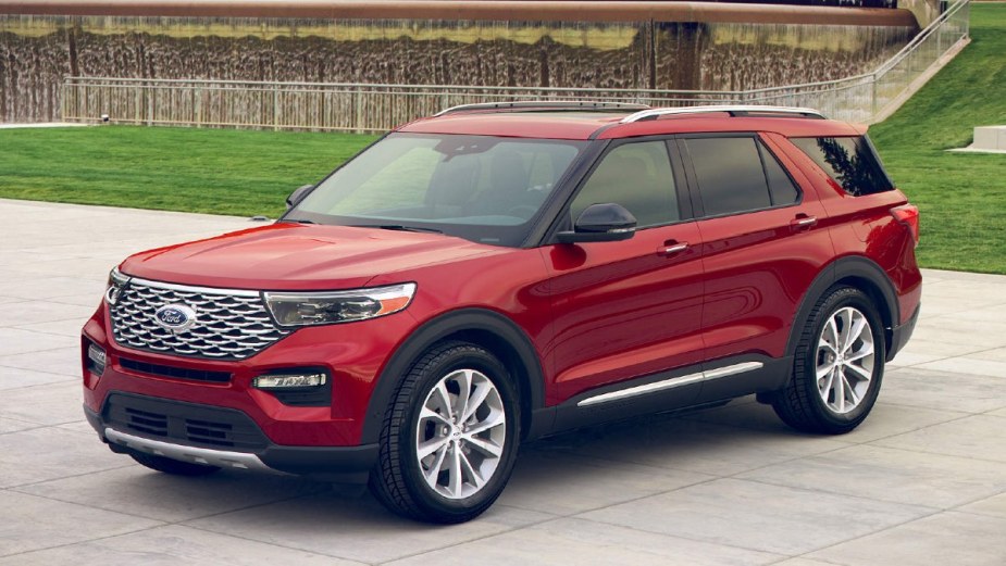 Front angle view of new 2023 Ford Explorer SUV with Rapid Red exterior paint color