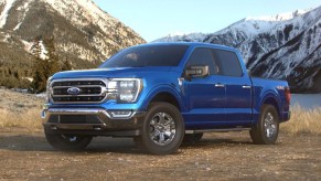 Front angle view of new 2023 Ford F-150 pickup truck with Atlas Blue exterior paint color