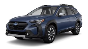 Front angle view of new 2023 Subaru Outback crossover SUV with Cosmic Blue Pearl exterior paint color