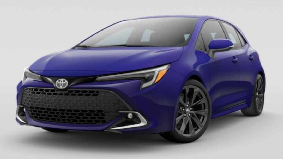 Front angle view of new 2023 Toyota Corolla Hatchback with Blue Crush Metallic exterior paint color