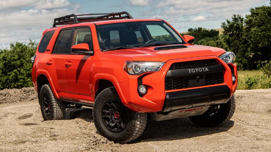 Front view of an orange 2023 Toyota 4Runner midsize SUV