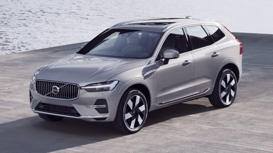 Front angle view of silver 2023 Volvo XC60, cheaper 2023 BMW X3 luxury SUV alternative costing under $45,000