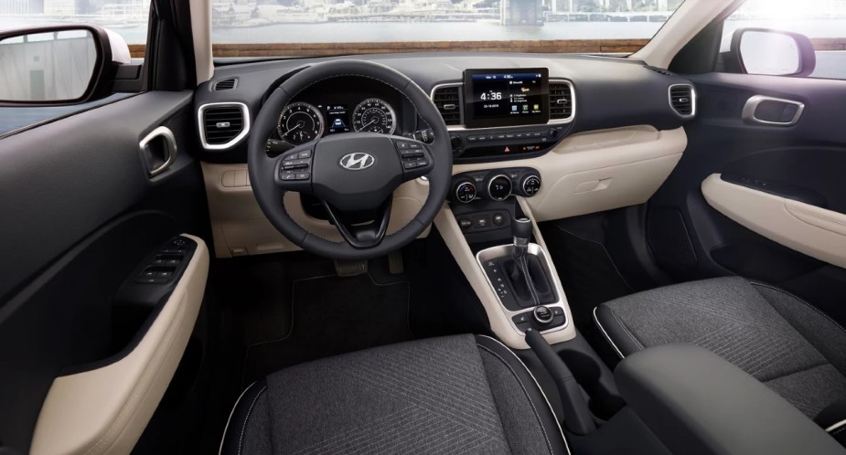 The interior of a 2022 Hyundai Venue subcompact SUV. 