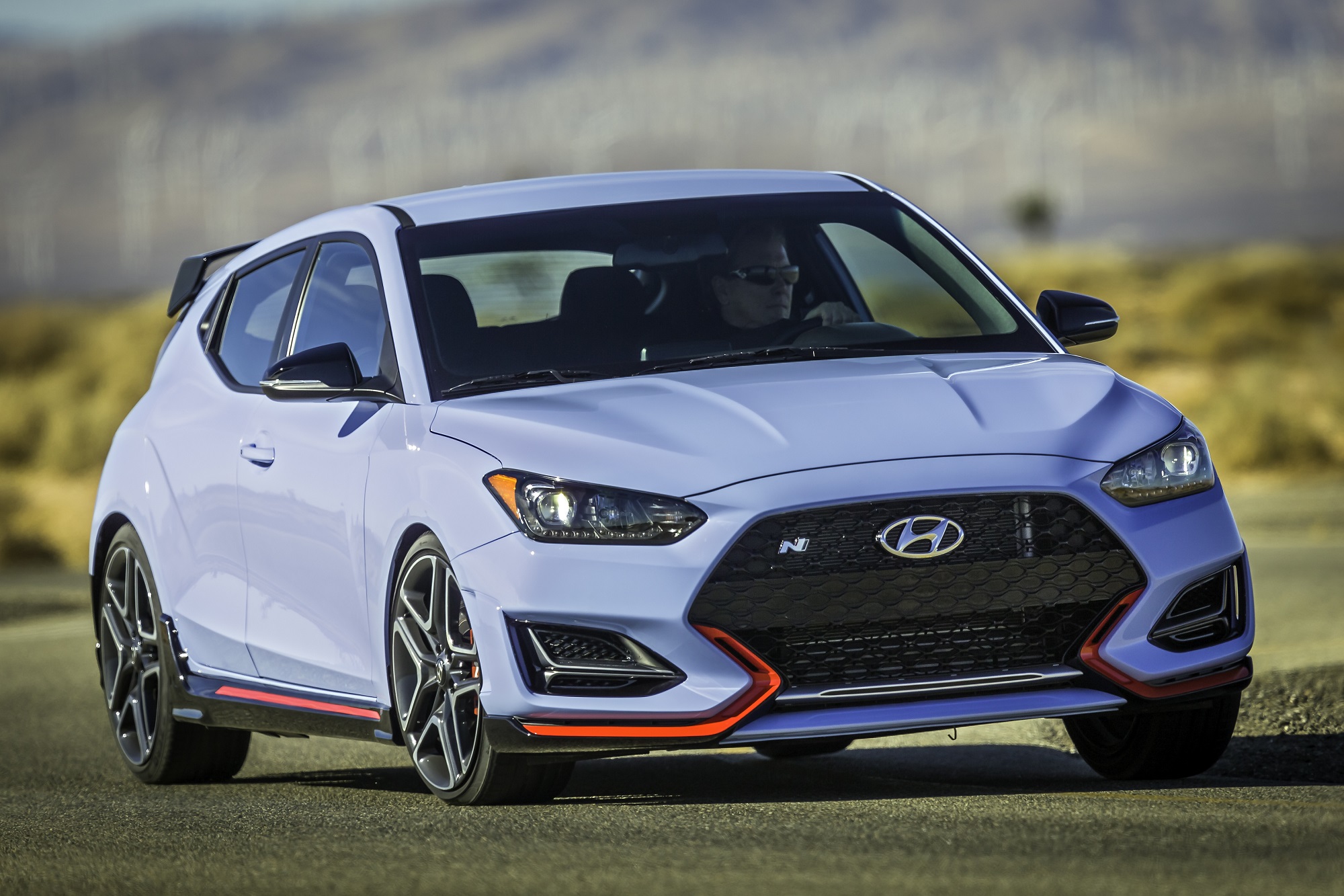 A blue 2022 Hyundai Veloster N is one of the most fuel efficient hot hatchbacks you can get.