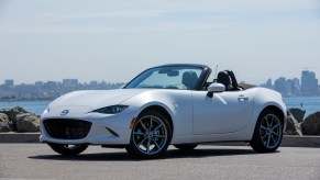 A white Mazda MX-5 Miata, among the most fuel efficient cars.