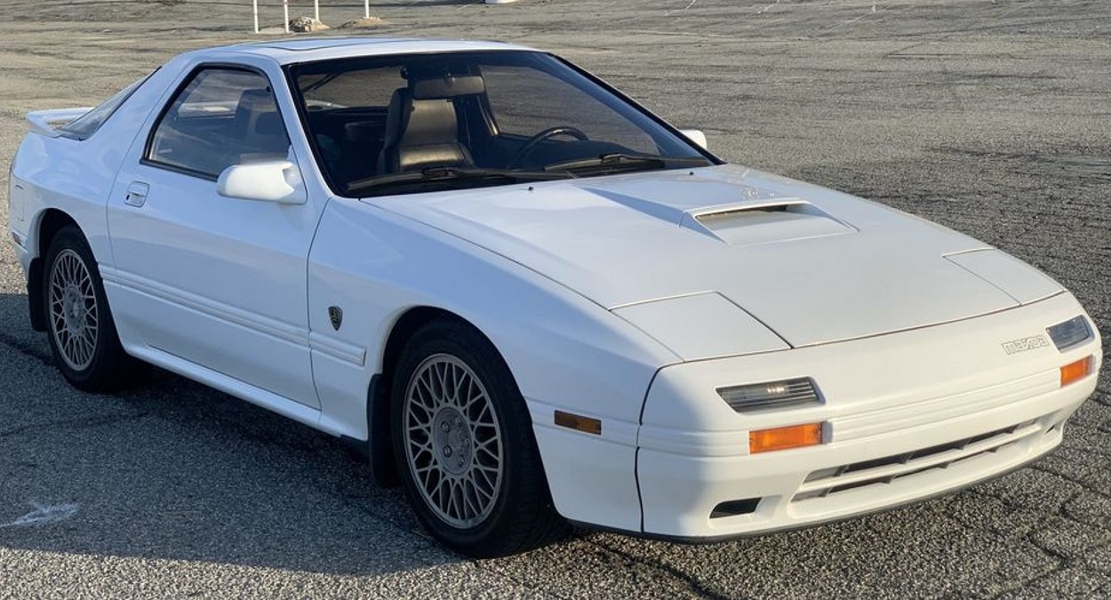 White Mazda RX7 parked