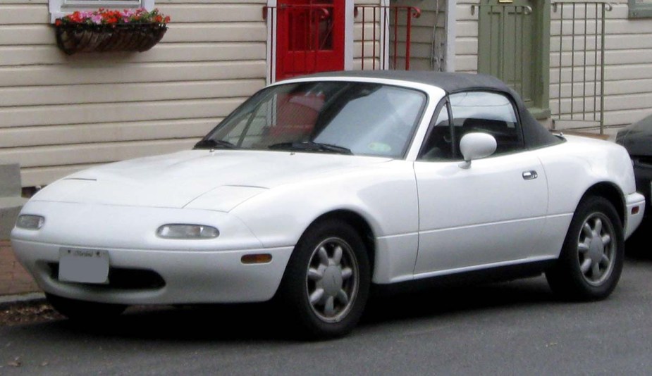 A first-generation Mazda Miata in white