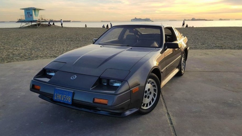 Black Nissan 300ZX parked by the beach