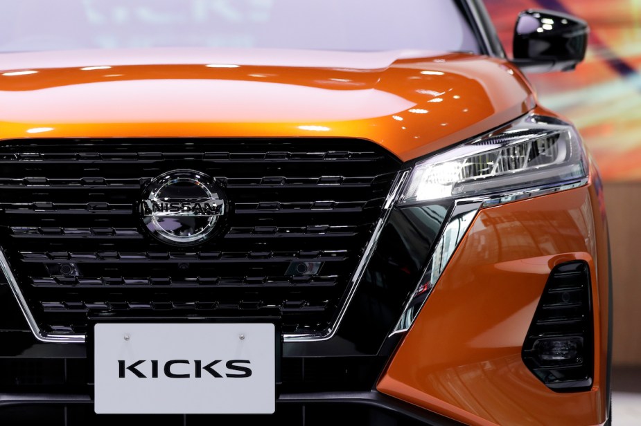 An orange Nissan Kicks, maker of the 2024 Nissan Kicks. It is one of the most fuel efficient non-hybrid SUV of 2022 with great fuel economy.