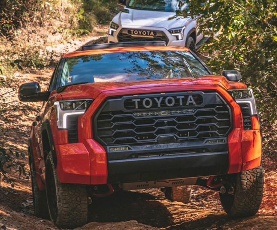 Orange Toyota Tundra TRD Pro on a Trail as a full-size pickup truck.