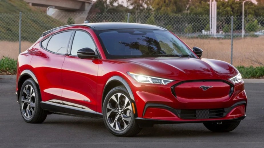 Red 2021 Ford Mustang Mach-E electric SUV posed
