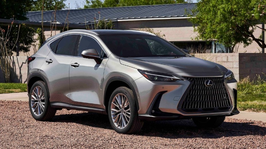 2022 Lexus NX 350h silver parked in front of a house