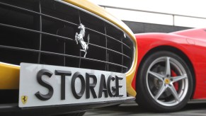 A number plate reading STORAGE is viewed on a sports cars.