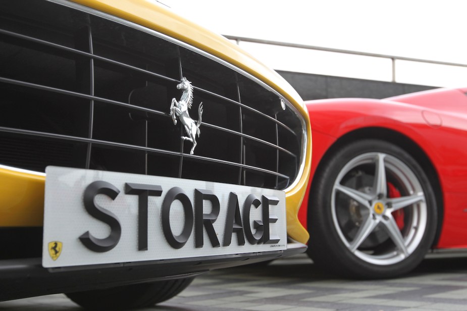 A number plate reading STORAGE is viewed on a sports cars. 