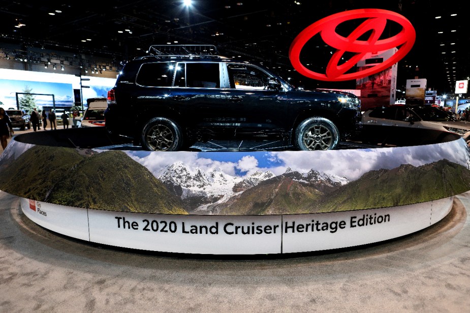A 2020 Toyota Land Cruiser Heritage Edition is on display at an auto show.