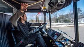 A trucker pulling on the cable to sound the horn knowing what it means when truckers honk their horns?