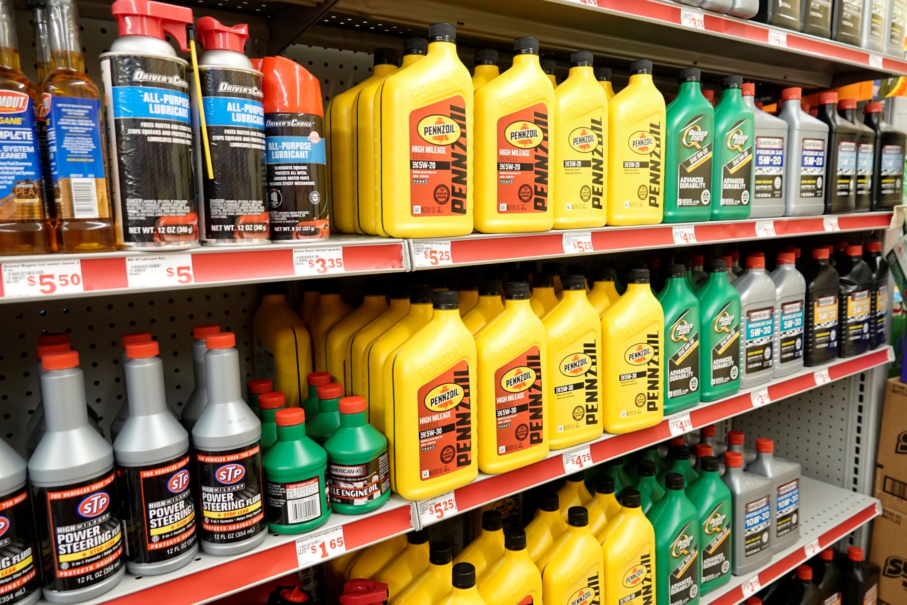Car oil and fluids on the shelf of a Family Dollar Store