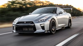 A Nissan GT-R driving down a road