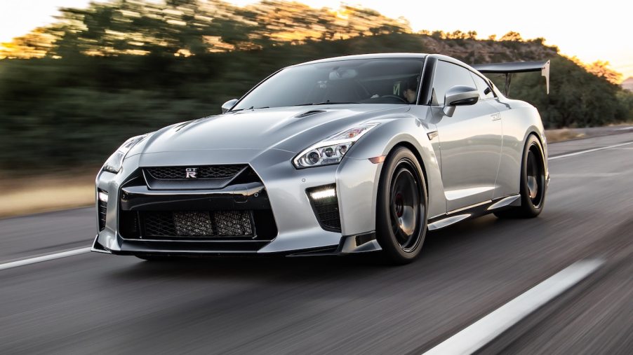 A Nissan GT-R driving down a road