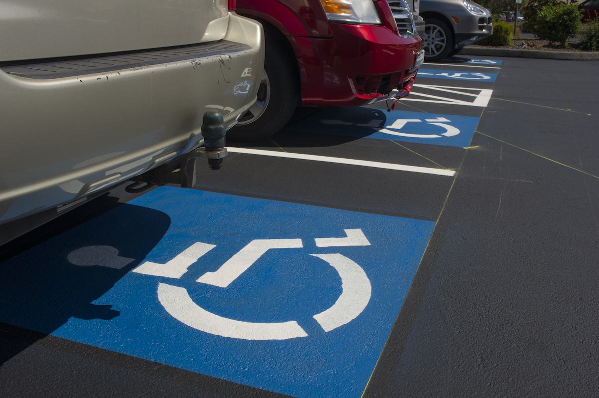 Is It Illegal to Drive With a Handicap Parking Permit on Your RearView