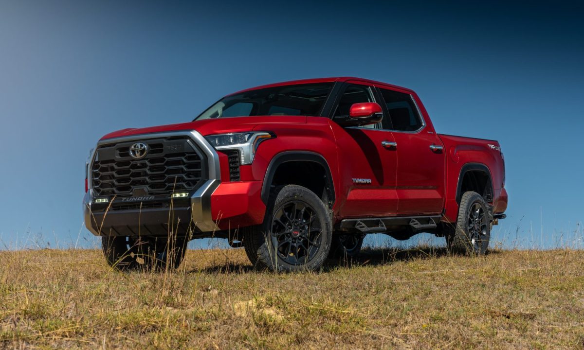 a lifted red 2023 Toyota Tundra 