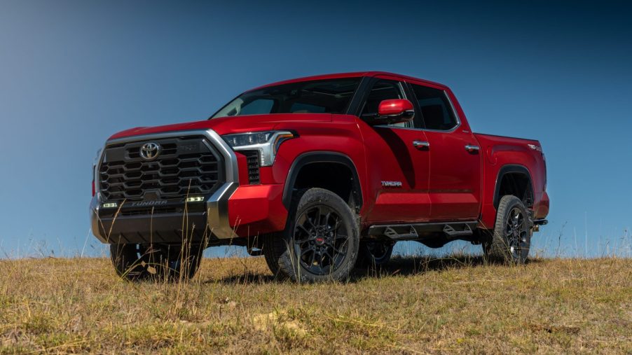 a lifted red 2023 Toyota Tundra