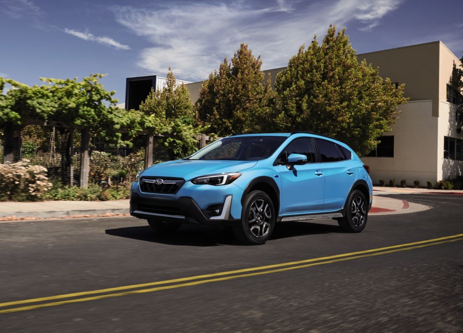 A light blue 2023 Subaru Crosstrek plug-in hybrid electric vehicle (PHEV) compact SUV