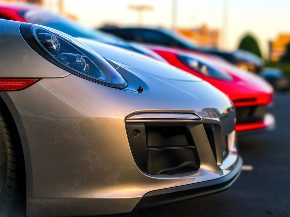 A close-up shot of a row of Porsches