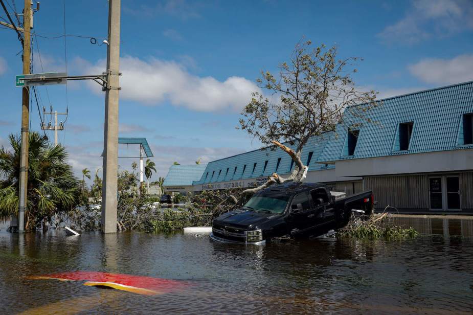A flooded car following Hurricane Ian
