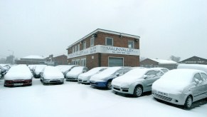 A snow-covered dealership.