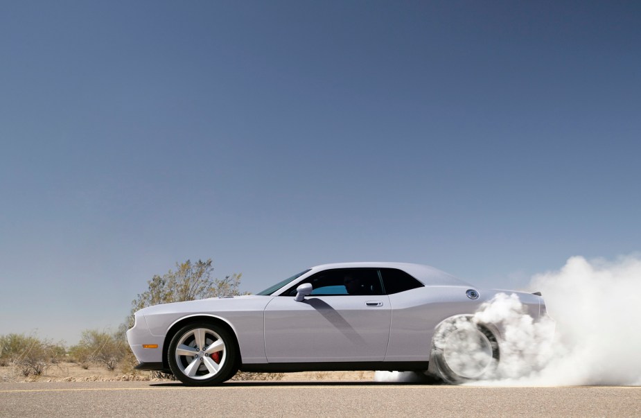 The Dodge Challenger SRT8, like the SVT Cobra Terminator, are some of the fastest used muscle cars under $20,000. 