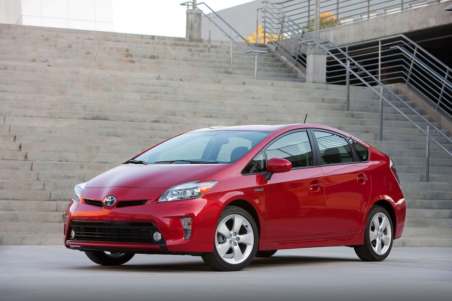 This red Toyota Prius hybrid has proven to be one of the most reliable decade-old sedan cars available.