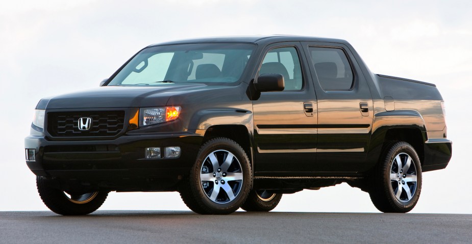 This black 2014 Honda Ridgeline pickup is one of the most reliable used midsize trucks you can buy. 