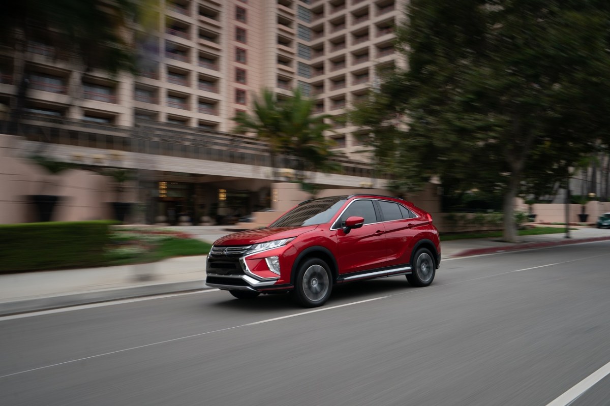 a red Eclipse cross on a city street
