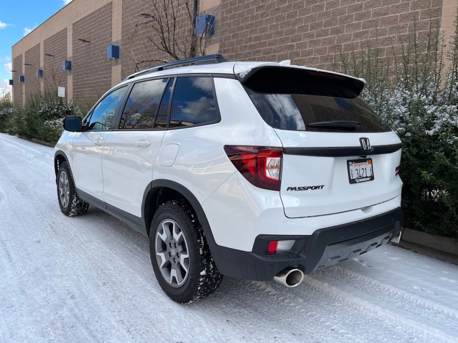 2022 Honda Passport Trailsport rear view in a snow patch
