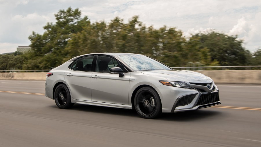 A 2022 Toyota Camry Hybrid driving, the Camry Hybrid is the best new Toyota model in U.S. News' rankings