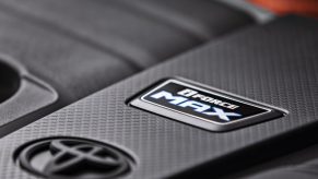 Detail shot of the engine cover of the Toyota Tundra's i-FORCE MAX hybrid V6 turbocharged engine.
