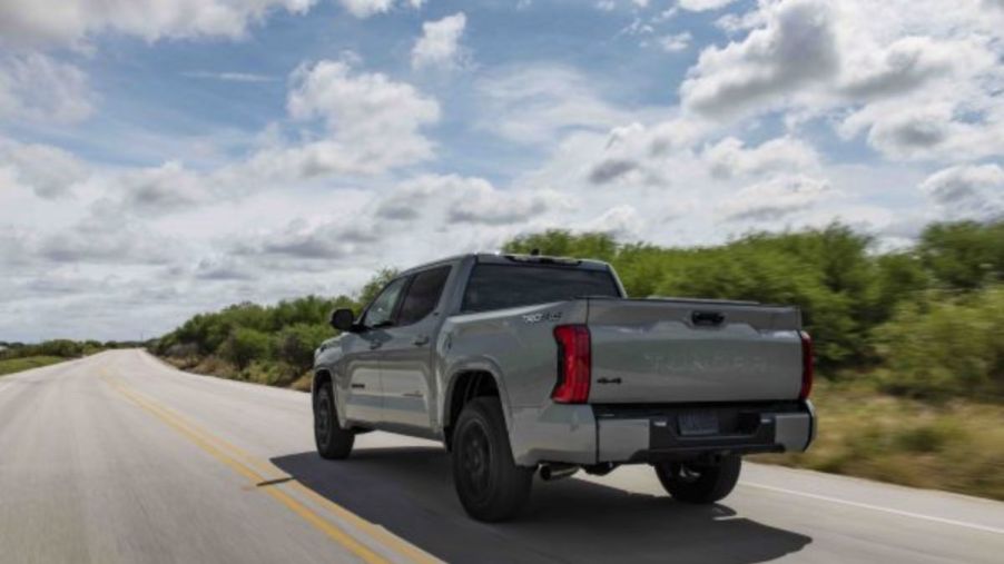 A 2022 Toyota Tundra driving down an open road.