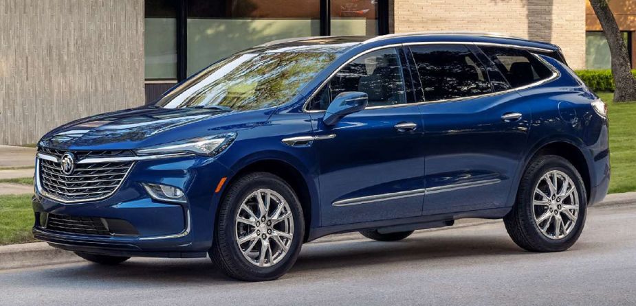 A blue 2023 Buick Enclave midsize luxury SUV model