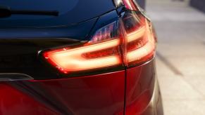 Taillight of the new Ford Edge in red.