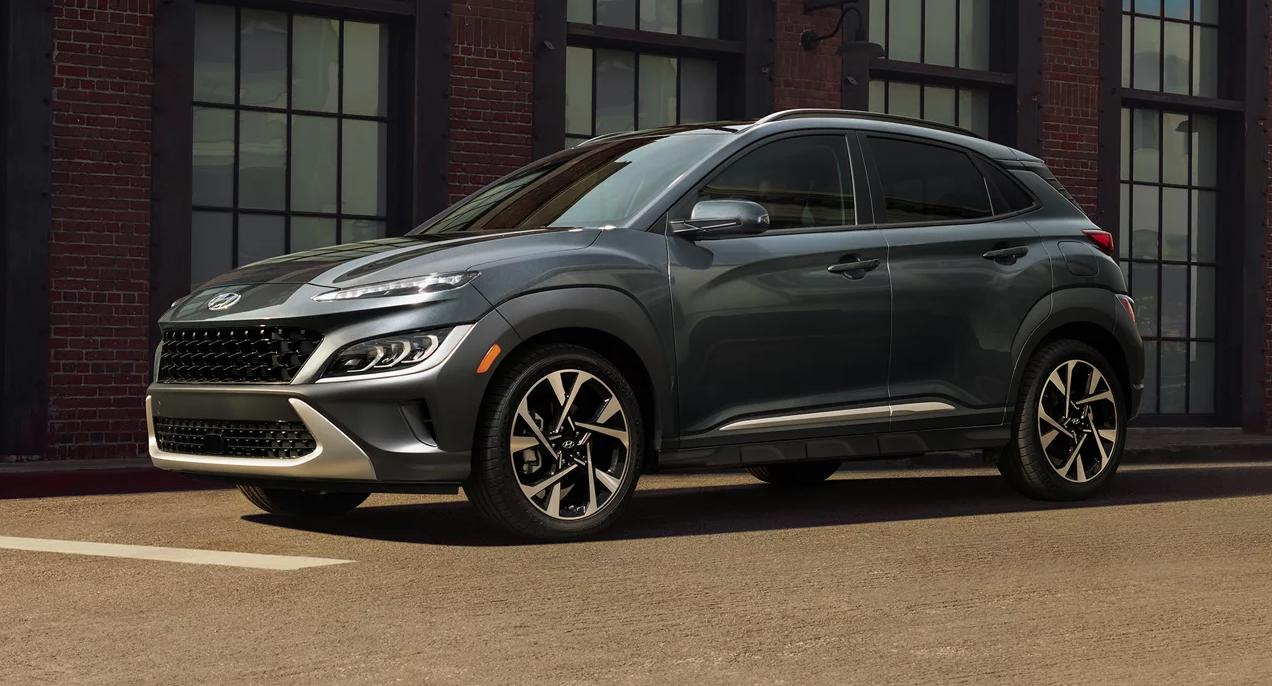 A black 2023 Hyundai Kona subcompact SUV is parked.