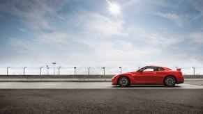A red 2023 Nissan GT-R parked