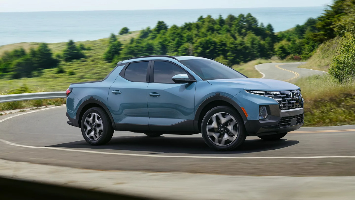 Hyundai's small truck, the 2023 Hyundai Santa Cruz is cruising on the road.