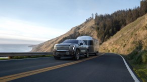 Front view of the 2024 GMC Sierra EV Denali Edition 1 trailering.