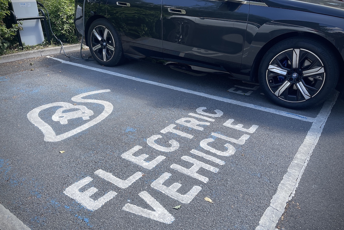 A parking spot as one of the many EV charging stations.