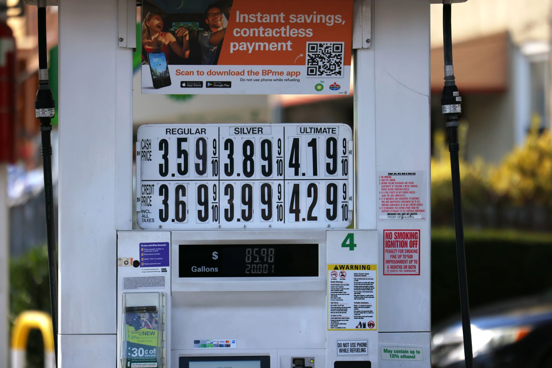 A BP gas station pump in New York City with regular, silver, and ultimate options