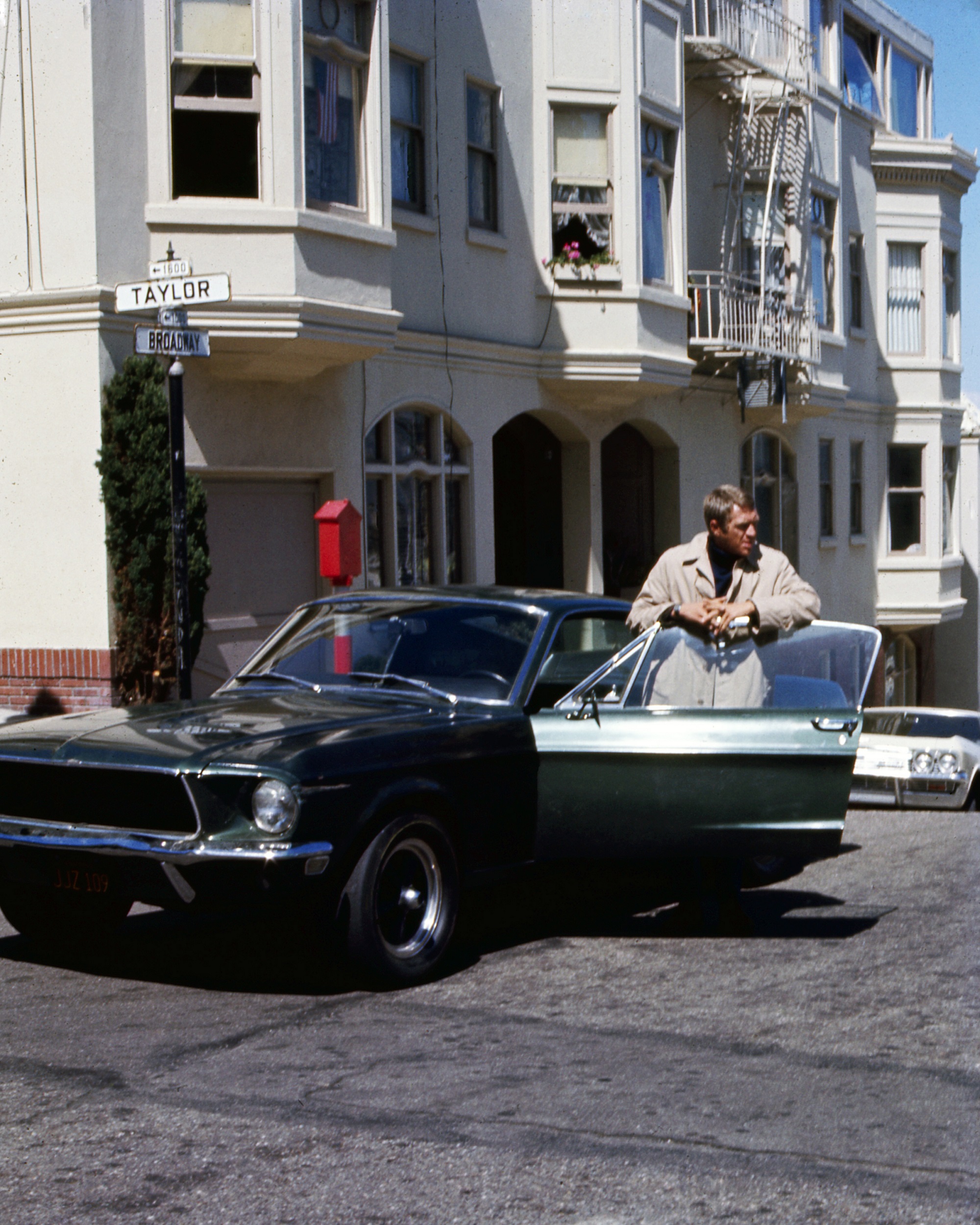 Steve McQueen hangs out with a Ford Mustang Bullitt GT390, which Bradley Cooper will have to top in the Bullitt remake.