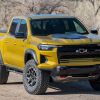 2024 Chevrolet Colorado ZR2 with boulder background
