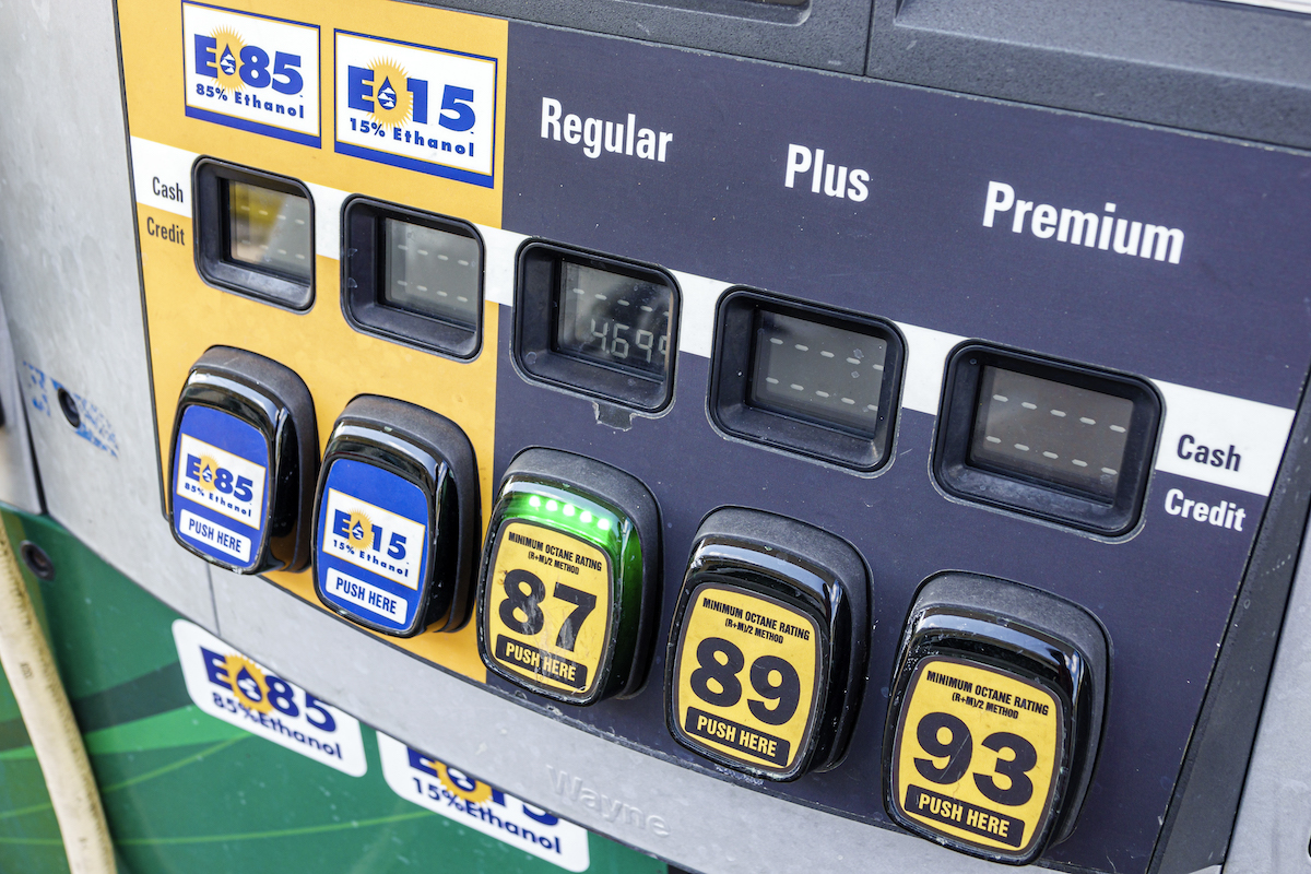 A gas pump displaying different grades of gasoline, including E15 gas.